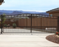 arched gate with dog guard pickets