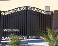 driveway gate with solid steel back comp