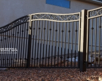 iron gate with forged scrolls