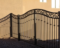 steel hand forged scroll with recurve arch gate