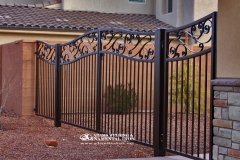 arched gate with scrolls