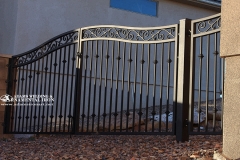 iron gate with forged scrolls