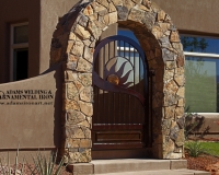 rust patina gate with copper sun