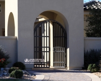 contemporary arched security courtyard gate