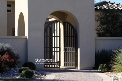 contemporary arched security courtyard gate