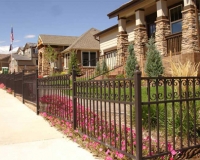 Ornamental fence with C scrolls