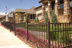 Ornamental fence with C scrolls
