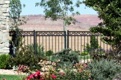fence with cast scrolls